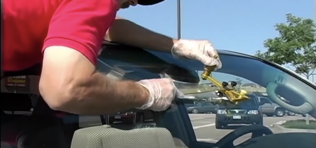 Windshield repair service being done professionally
